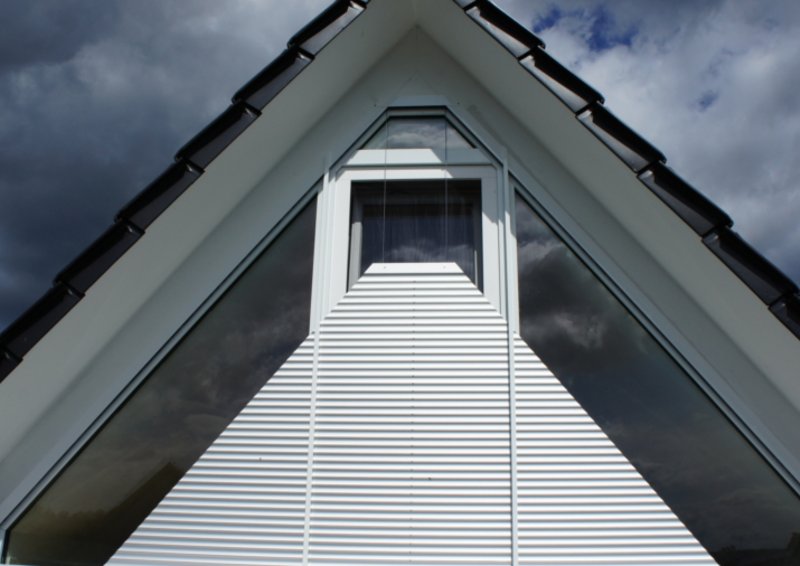 Gable window roller shutter